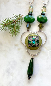 Green necklace with pewter and "Gems"